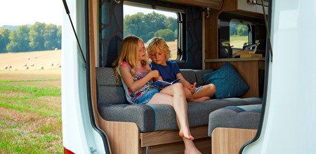 Two children in motorhome